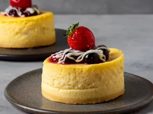 PORCIÓN CHEESE CAKE COCIDO
